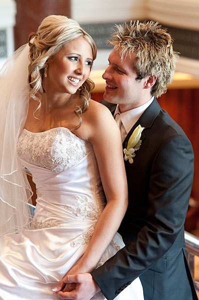 Wedding Photography in Melbourne, showing the Park Hyatt hotel and a bridal couple. Wedding Photography of a Melbourne bridal couple enjoying an intimate candid moment at the Park Hyatt Hotel,
